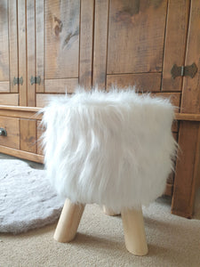 White faux outlet fur stool