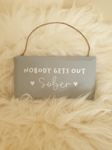 Nobody gets out Sober plaque