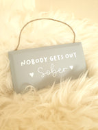 Nobody gets out Sober plaque