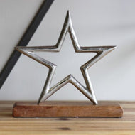 Star on wooden Base